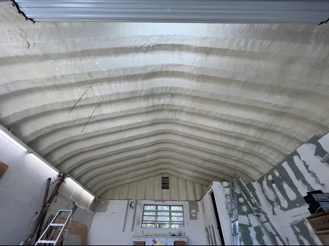 Spray polyurethane foam applied to the underside of a metal roof deck in Cleveland